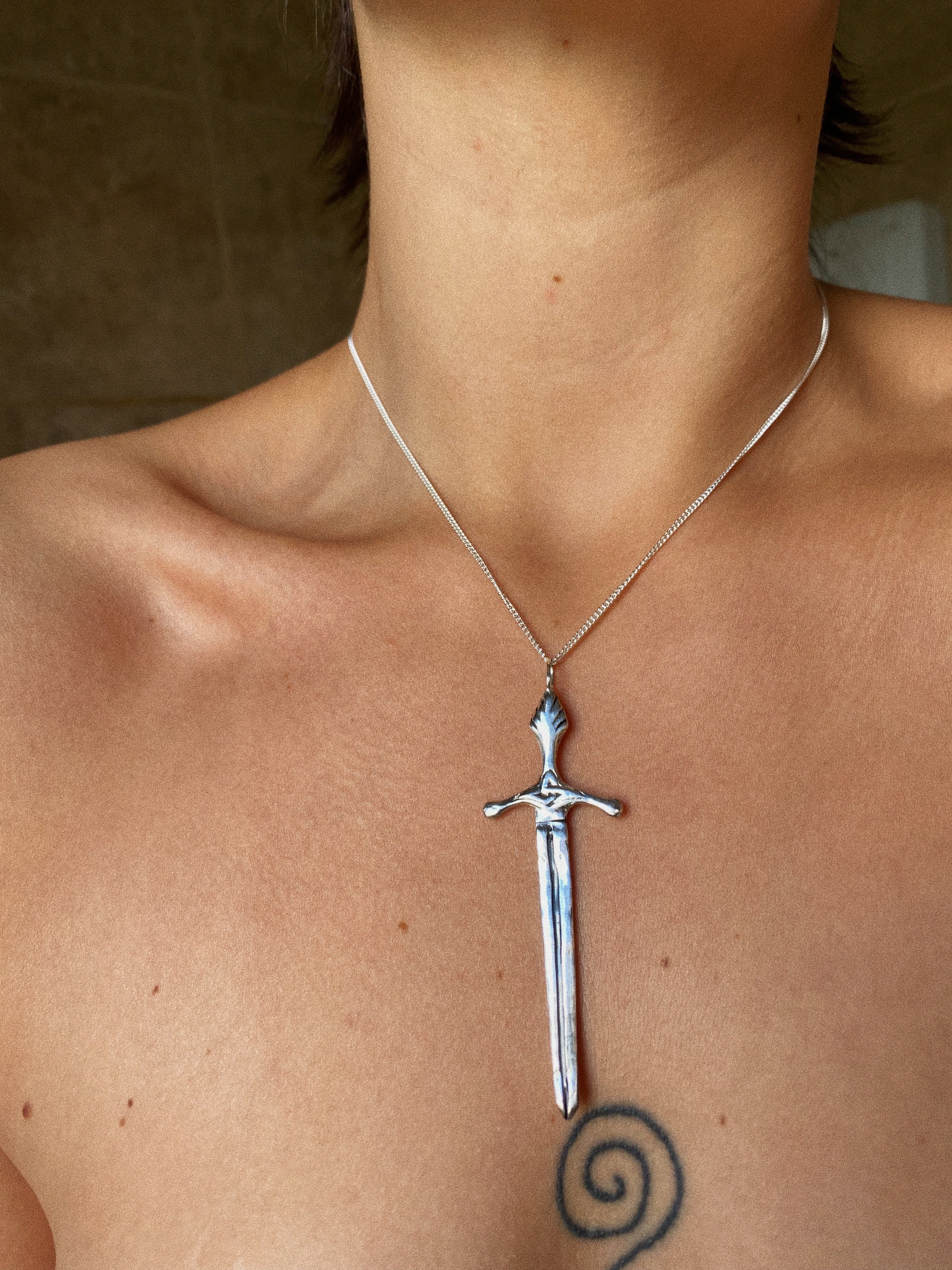 orna sword necklace